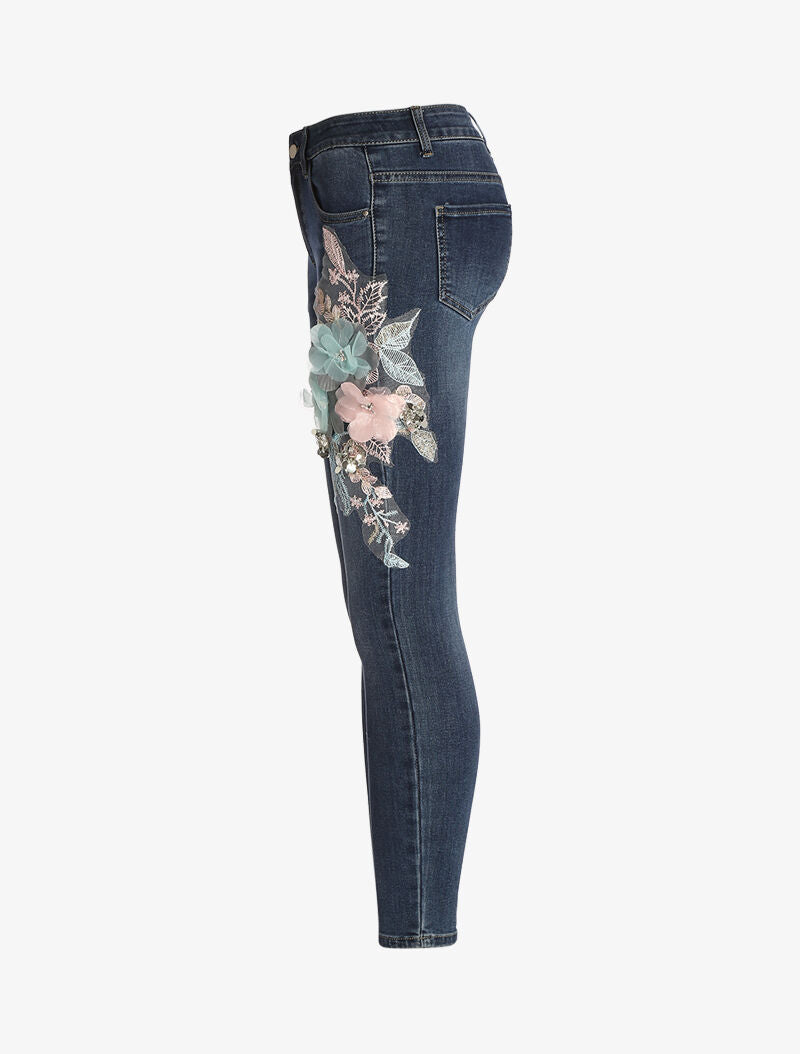 Jean 7/8 à empiècements fleuris - denim brut